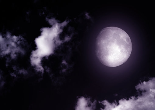 The moon in the night sky in clouds © marusja2
