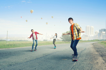 Obraz premium Teenagers ride skateboards . Mixed media