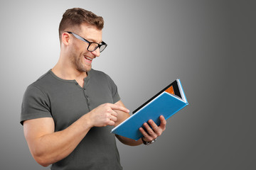 young man with a book