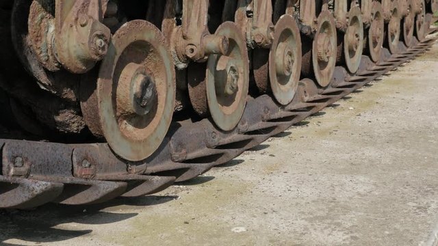 Tank tread transport system World War two armed vehicle close-up 4K 2160p 30fps UHD tilting footage