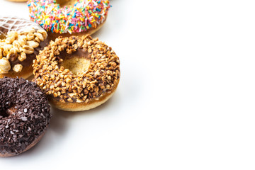 various donuts on white background