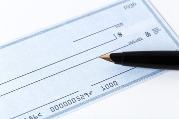 cheque with pen