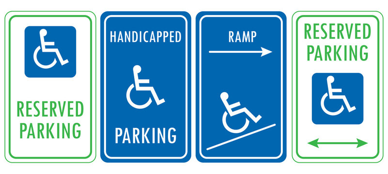 Handicapped reserved parking signs. Wheelchair ramp access sign