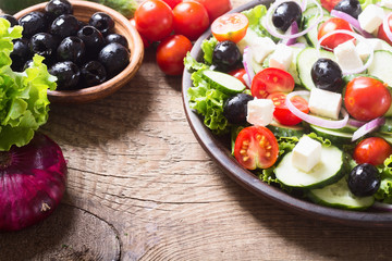 Obraz na płótnie Canvas Photo of fresh greek salad