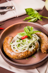 sausage with onion and basil