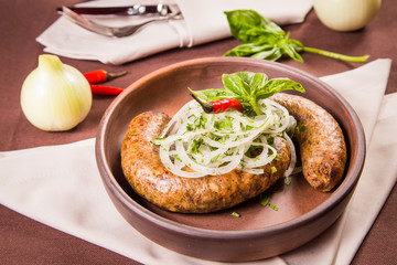 sausage with onion and basil