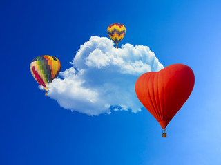 beautiful scene by hot air balloons on the cloudscape and sun