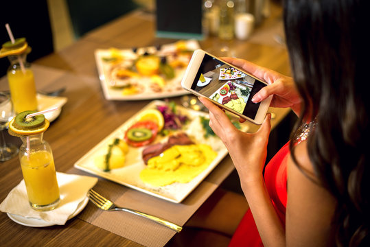 Taking food photos in restaurant