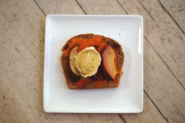 Multigrain toast with butternut squash, roasted pears and goat cheese