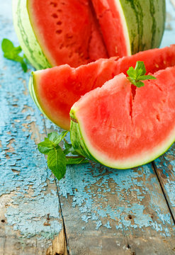 Watermelon sliced with mint close up on the table