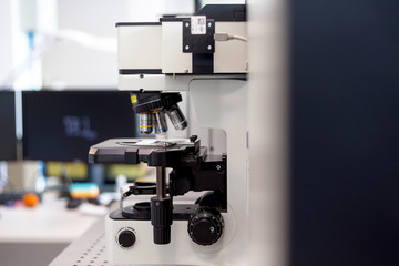 Study with a microscope in biology laboratories, scientific activity, biological microscope.