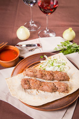 sausage with onion and parsley
