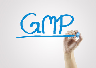 women hand writing GMP word on gray background for business strategy and used in manufacturing.