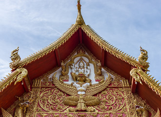 Golden gable with the angle sculpture