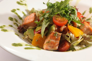 Salad with smoked salmon and vegetables Arugula