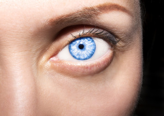Beautiful insightful look blue woman's eye