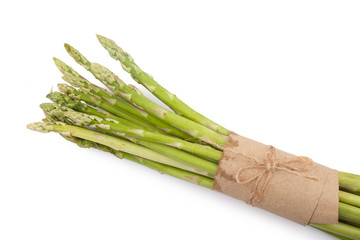 uncooked green asparagus tied with twine from above isolated on