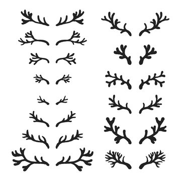 Set of hand drawn deer horns black on the white background, silhouette of antlers