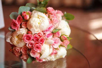 Beautiful peony and rose wedding bouquet, closeup. Marriage concept