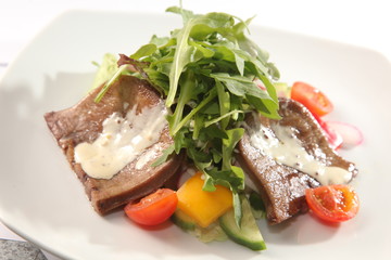 Salad with beef tongue and sauce
