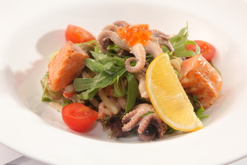 Salad with smoked salmon and seafood