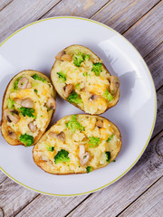Broccoli, Cheese and Mushroom Chowder Potato. View from above, top studio shot