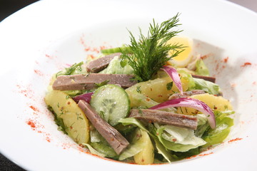 Salad with cucumber and potato