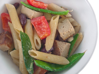 vegan pasta with vegetable, smoked tofu and almond cream sauce