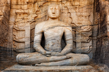 Fototapeta na wymiar Ancient sitting Buddha image