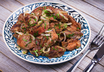 Sauteed chicken liver with apple and onion
