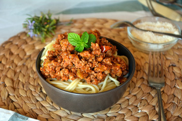 Spaghetti bolognese with meat, tomato sauce and vegetables