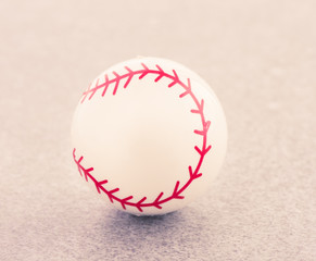 Miniature baseball toy still life. Concept of sport, leisure activity and play.