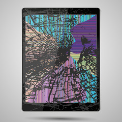 tablet computer with broken glass screen isolated on gray background