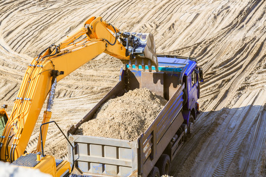 Excavator Loading Truck With Sand