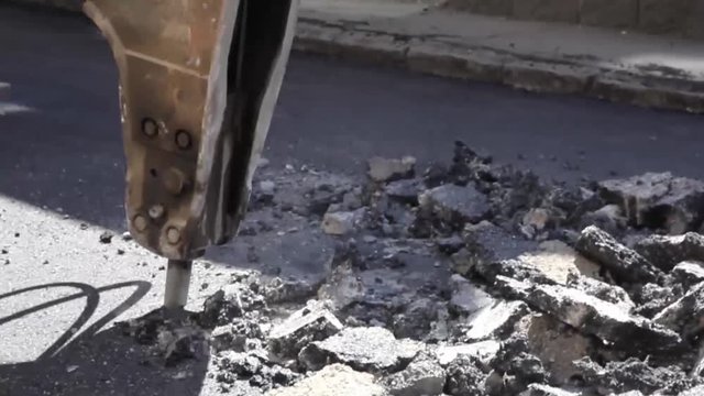Demolish Machine Working On The Street