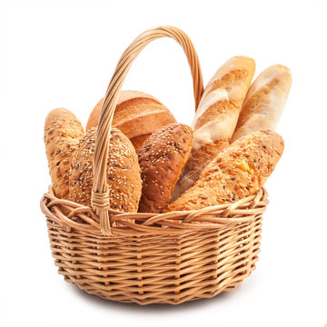 different types of bread in a basket isolated