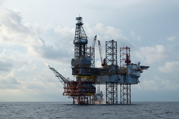 Offshore construction platform for production oil and gas, Oil and gas industry and hard work,Production platform and operation process by manual and auto function, oil and rig industry and operation.