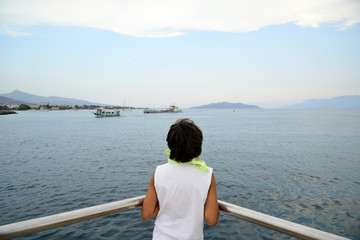 Fototapeta na wymiar Boy dream holidays in Greece