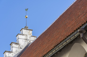Wind-vane on roof top of church