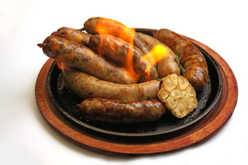 grilled sausages with flame