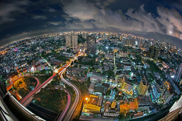 Fototapeta na wymiar Bangkok expressway , motorway and highway top view with many building at night
