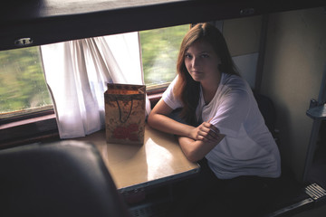 Beautiful Woman Sitting at Train