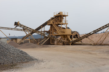 huge mining machine in industrial area of gravel pit