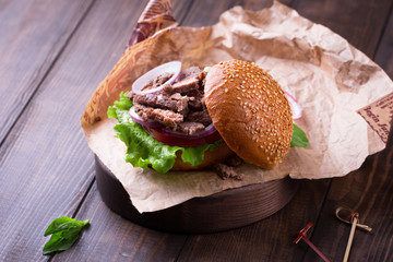 Delicious beef burger with salad ingredients