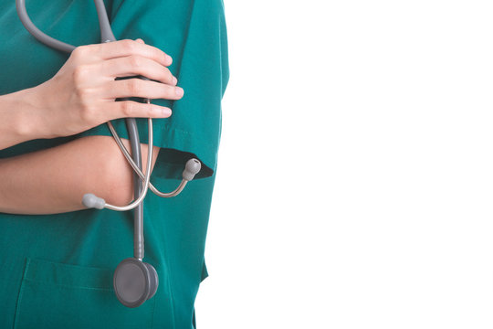 Doctor with a stethoscope in the hands on white background