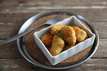 nuggets on wood background