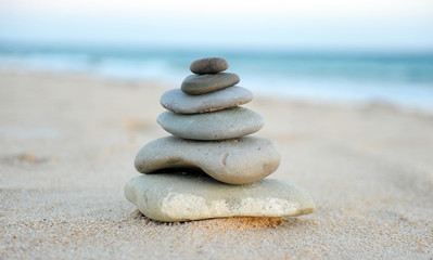 Zen stones on the sand