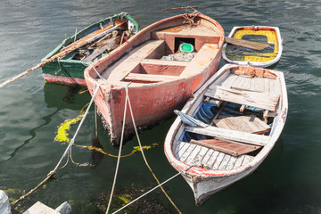 Old small fishing boats moored in port of Avcilar