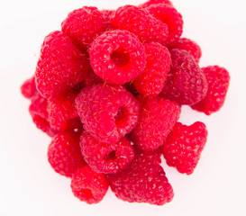Raspberries: a stack of fruit on white background