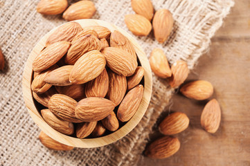 Almond snack fruit in wooden bowl